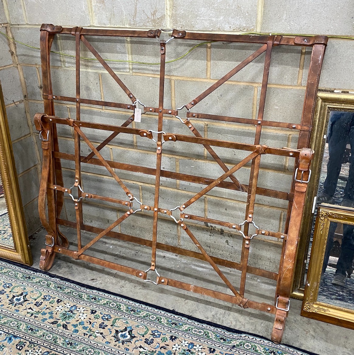 An 'And so to bed', cast iron Handel faux leather double bedframe, (no side rails), width 154cm, height 146cm